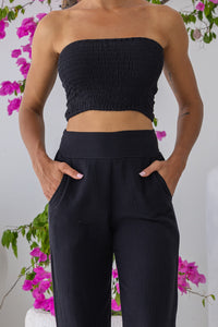 Womens stylish, super soft 100% cotton Rachel Trousers in black, featuring an elasticated waist and pockets for a flattering and comfortable fit