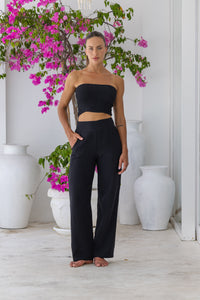 Womens stylish, super soft 100% cotton Rachel Trousers in black, featuring an elasticated waist and pockets for a flattering and comfortable fit