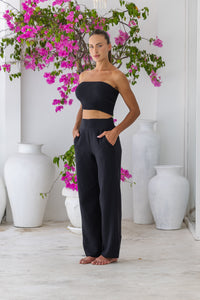 Womens stylish, super soft 100% cotton Rachel Trousers in black, featuring an elasticated waist and pockets for a flattering and comfortable fit