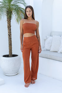 Womens stylish, super soft 100% cotton Rachel Trousers in terracotta, featuring an elasticated waist and pockets for a flattering and comfortable fit