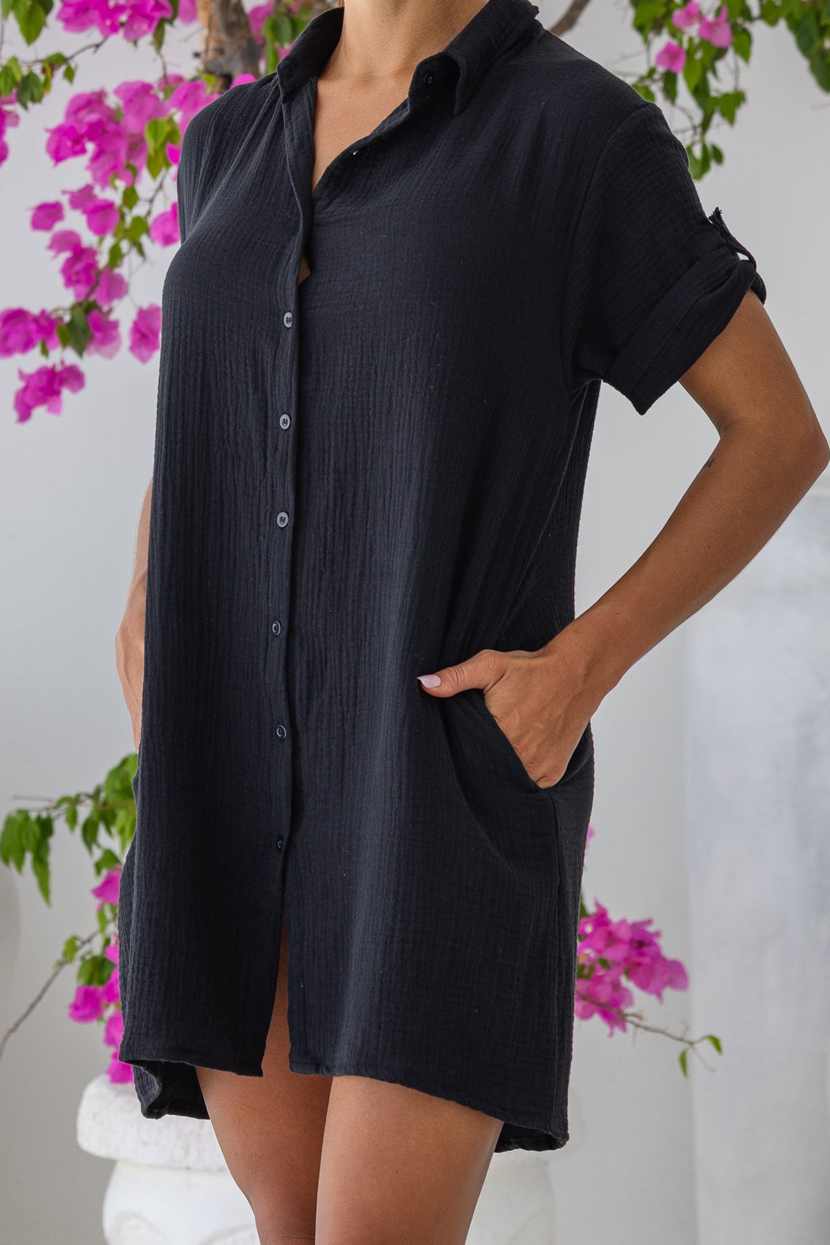 Womens super soft, 100% cotton Riley Shirt Dress in black with button down fastening, side pockets and 3/4 length sleeves with turn-up detail 