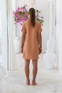 Womens super soft, 100% cotton Riley Shirt Dress in brick with button down fastening, side pockets and 3/4 length sleeves with turn-up detail 