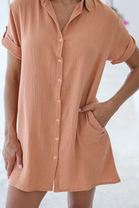 Womens super soft, 100% cotton Riley Shirt Dress in brick with button down fastening, side pockets and 3/4 length sleeves with turn-up detail 