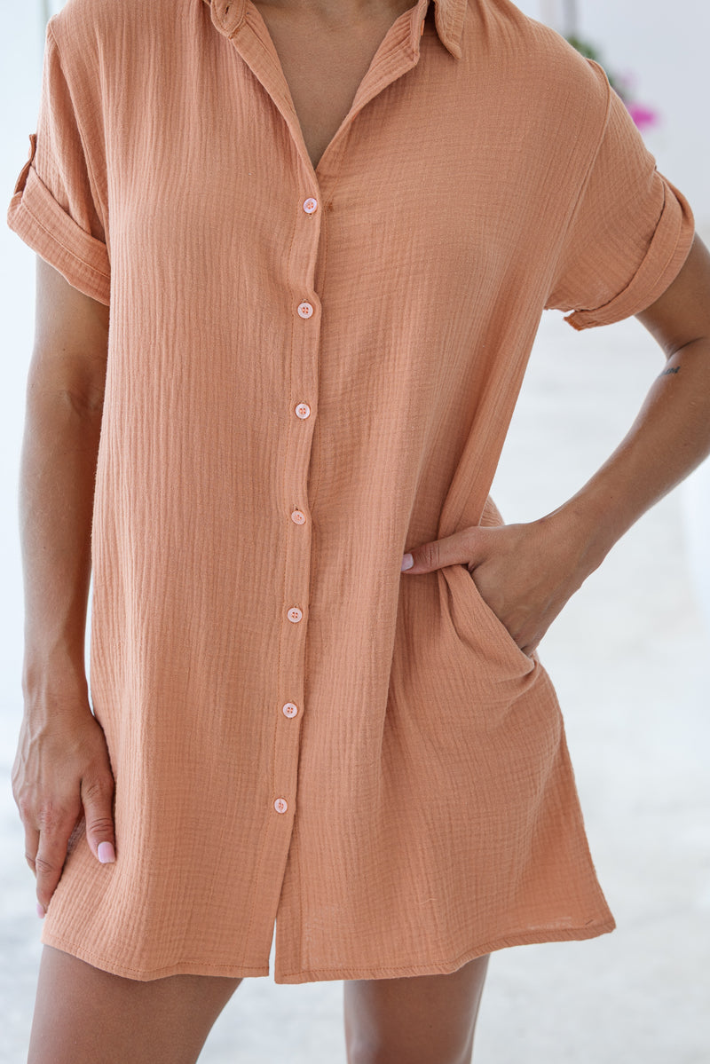 Womens super soft, 100% cotton Riley Shirt Dress in brick with button down fastening, side pockets and 3/4 length sleeves with turn-up detail 