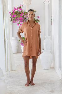 Womens super soft, 100% cotton Riley Shirt Dress in brick with button down fastening, side pockets and 3/4 length sleeves with turn-up detail 