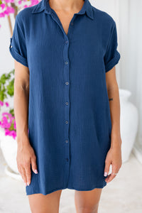 Womens super soft, 100% cotton Riley Shirt Dress in navy blue with button down fastening, side pockets and 3/4 length sleeves with turn-up detail 