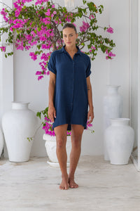 Womens super soft, 100% cotton Riley Shirt Dress in navy blue with button down fastening, side pockets and 3/4 length sleeves with turn-up detail 