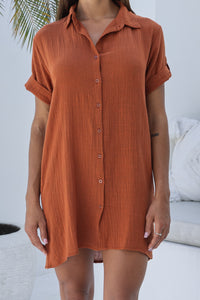 Womens super soft, 100% cotton Shirt Dress in Terracotta with button down fastening, side pockets and 3/4 length sleeves with turn-up detail 