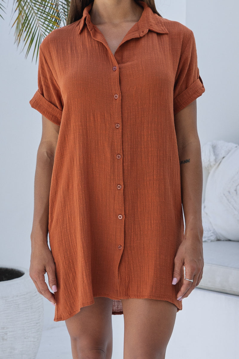 Womens super soft, 100% cotton Shirt Dress in Terracotta with button down fastening, side pockets and 3/4 length sleeves with turn-up detail 
