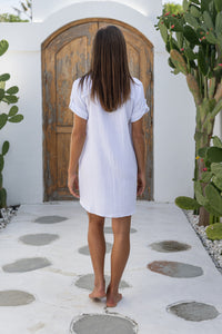 Womens super soft, 100% cotton Riley Shirt Dress in white with button down fastening, side pockets and 3/4 length sleeves with turn-up detail 