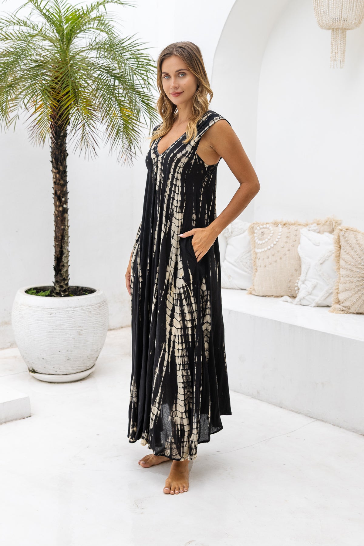 Womens Aria Maxi Dress in black tie dye, soft lightweight rayon with pockets, a detachable belt and hand beaded detailing.