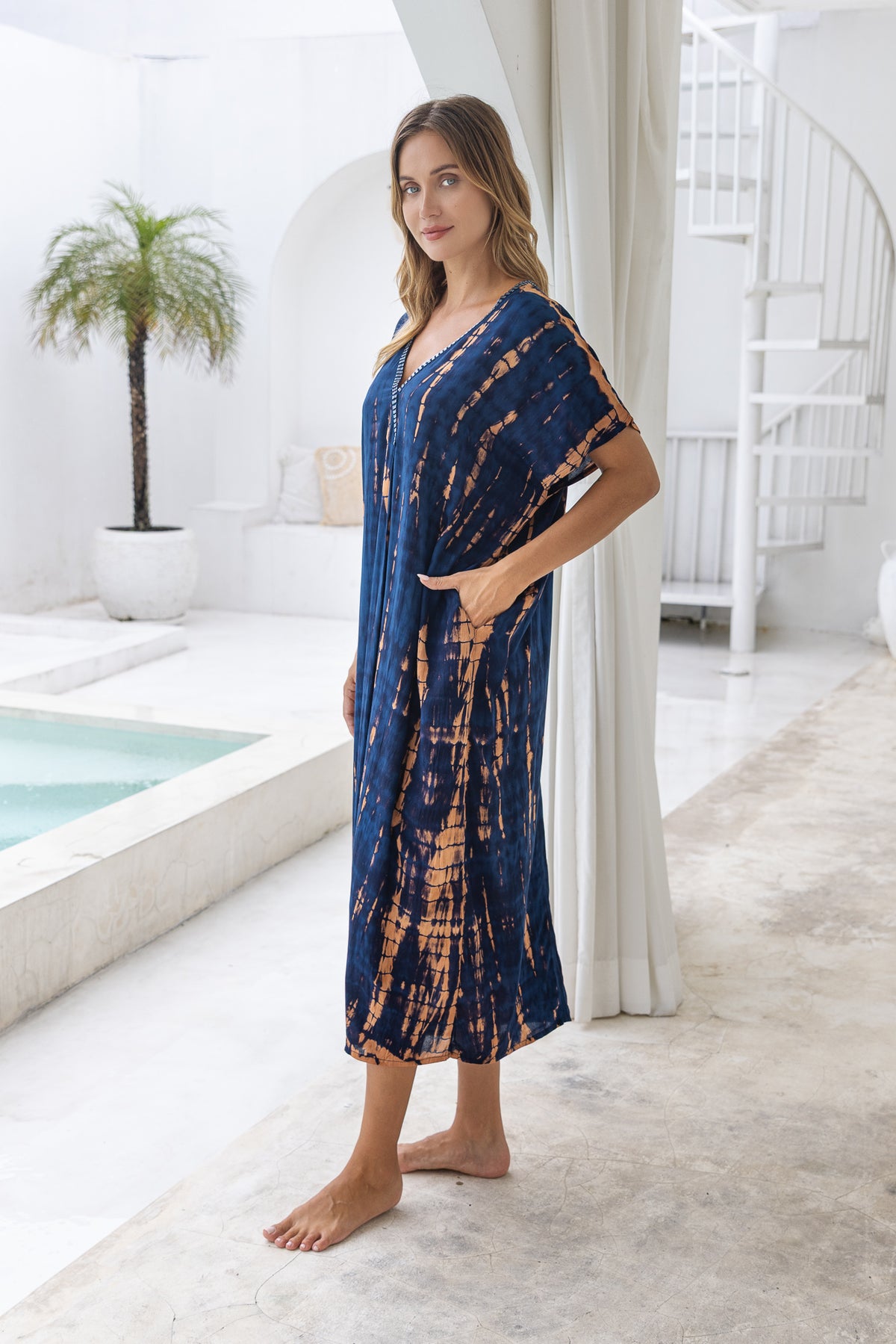 Womens Avery Kaftan dress in navy and copper tie dye, in soft lightweight rayon, with pockets and hand beaded detailing.