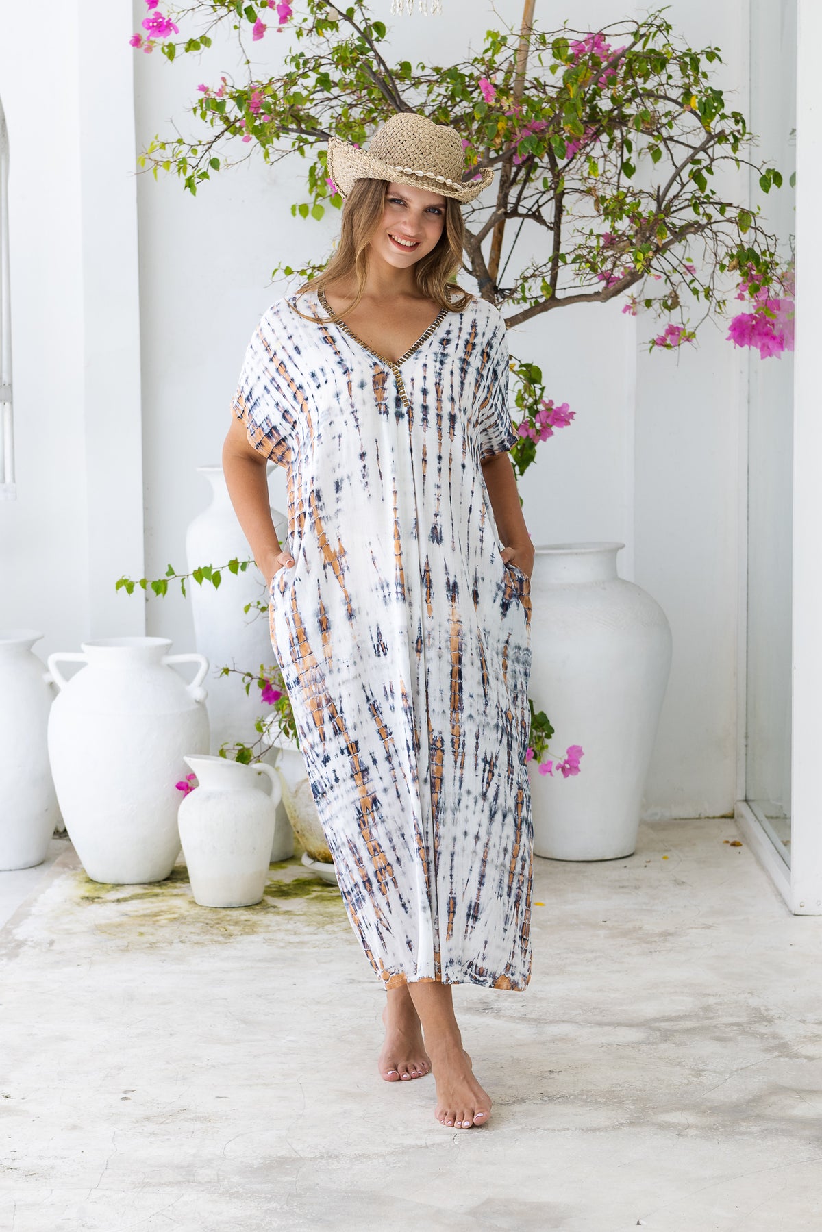 Womens Avery Kaftan dress in white and copper tie dye, in soft lightweight rayon, with pockets and hand beaded detailing. Plus size fit.