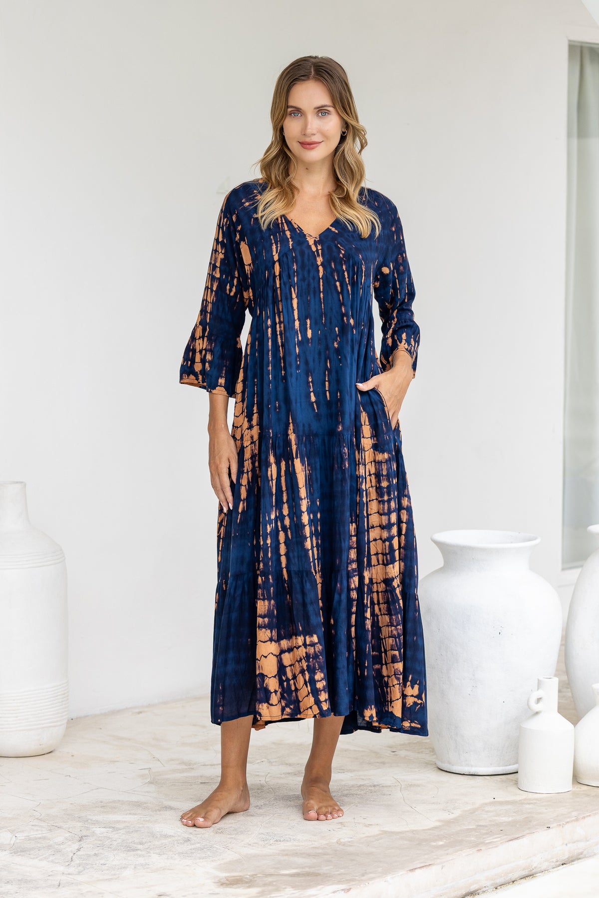 Womens Frida long smock dress in navy and copper tie dye, in soft lightweight rayon with discreet side pockets and 3/4 trumpet sleeves
