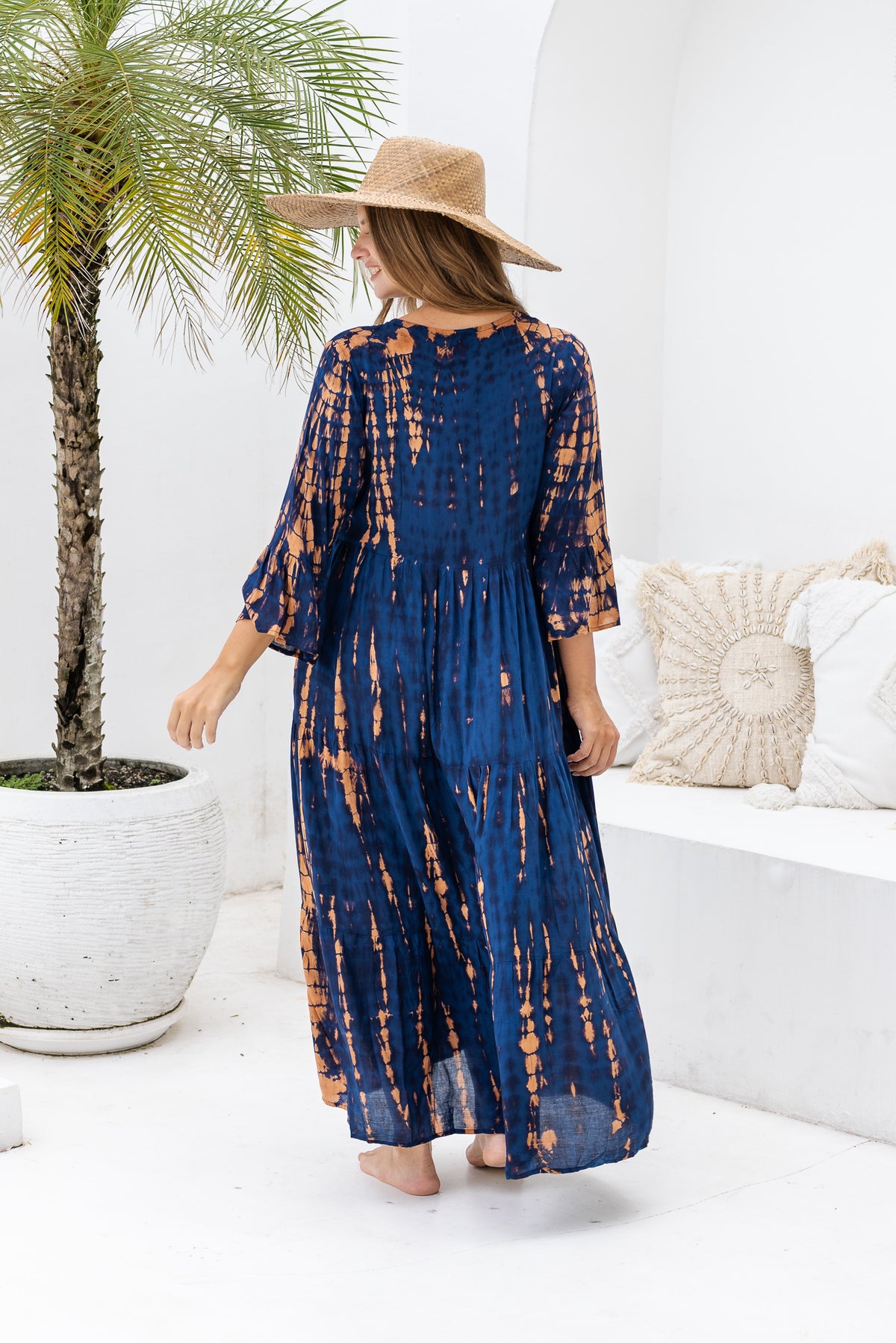 Womens Frida long smock dress in navy and copper tie dye, in soft lightweight rayon with discreet side pockets and 3/4 trumpet sleeves. Plus size fit.