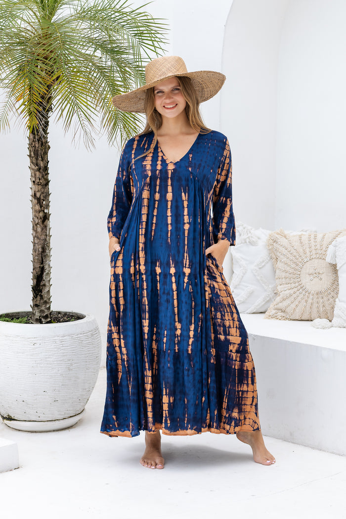 Womens Frida long smock dress in navy and copper tie dye, in soft lightweight rayon with discreet side pockets and 3/4 trumpet sleeves. Plus size fit.