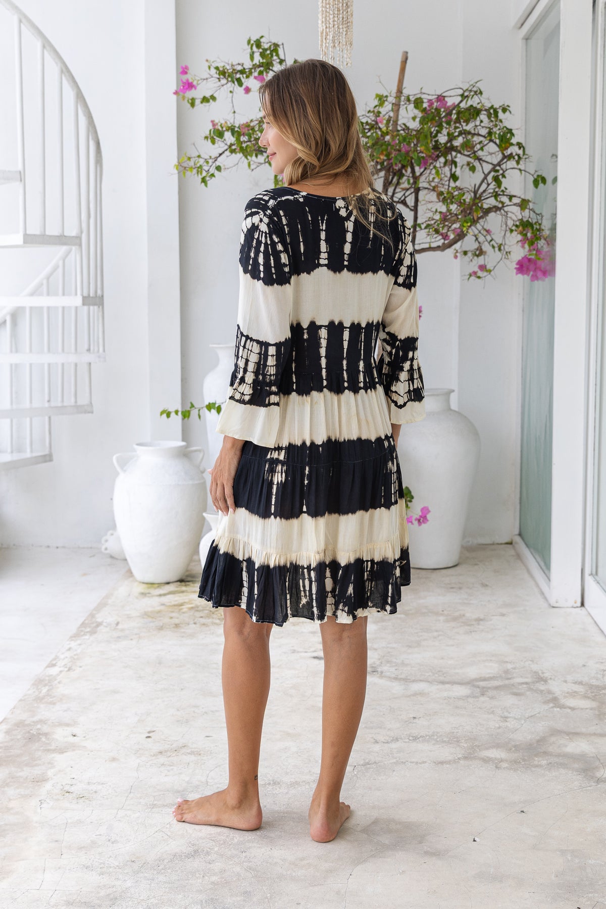 Womens Frida short smock dress in black and cream tie dye, in soft lightweight rayon with discreet side pockets and 3/4 trumpet sleeves