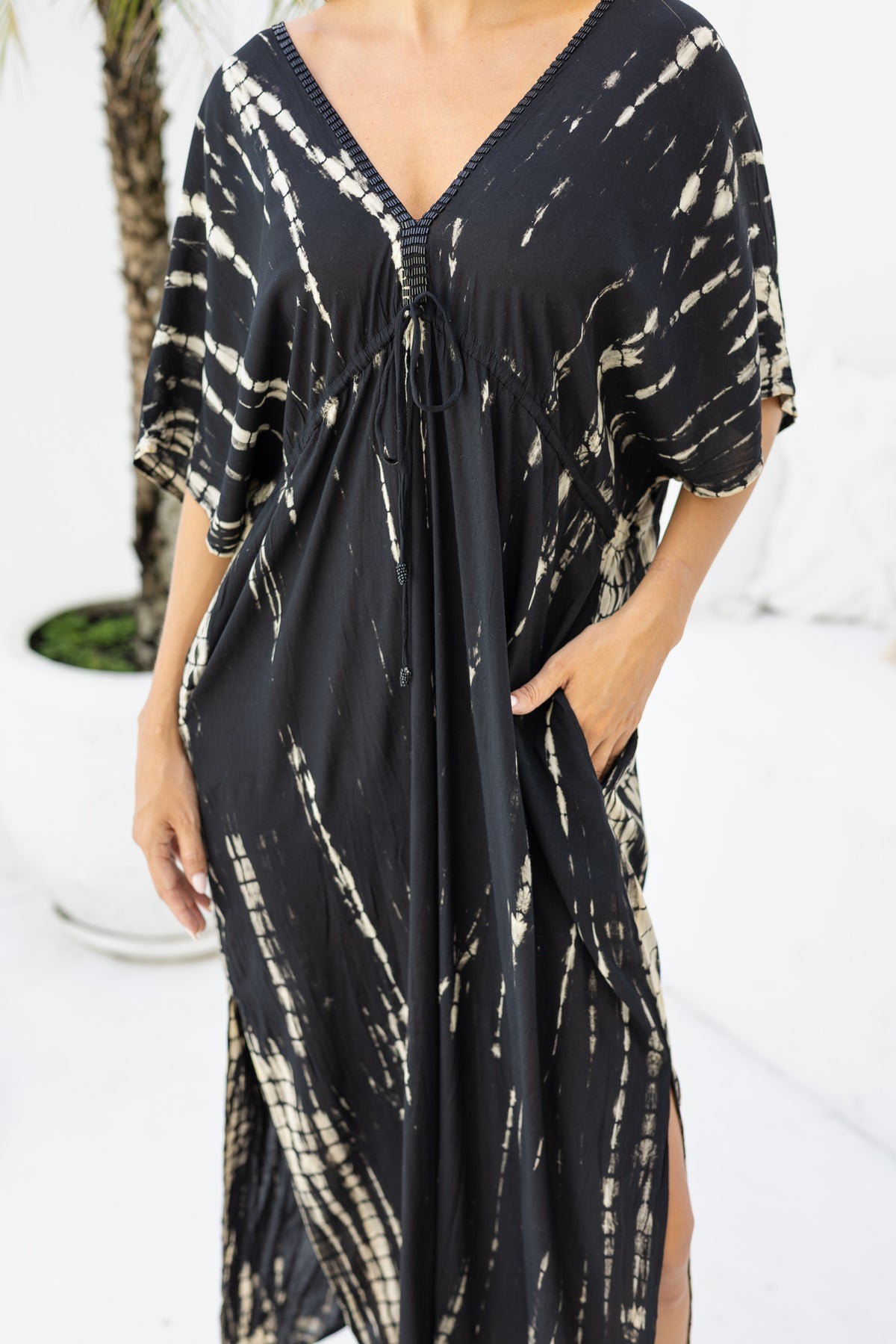 Womens Molly Kaftan in black and beige tie dye finish, in soft lightweight rayon, with side splits, pockets and hand beaded detailing.