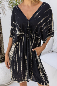 Womens Molly short length Kaftan in black and beige tie dye finish, in soft lightweight rayon, with side splits, pockets and hand beaded detailing.