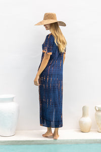Womens Nadia Maxi Dress in navy and copper tie dye finish, in soft lightweight rayon, with side splits, pockets and hand beaded detailing.