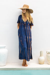 Womens Nadia Maxi Dress in navy and copper tie dye finish, in soft lightweight rayon, with side splits, pockets and hand beaded detailing.