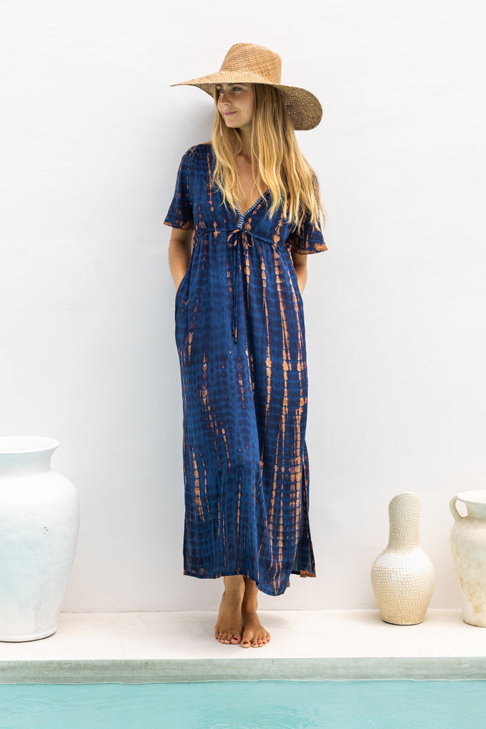 Womens Nadia Maxi Dress in navy and copper tie dye finish, in soft lightweight rayon, with side splits, pockets and hand beaded detailing.