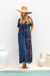 Womens Nadia Maxi Dress in navy and copper tie dye finish, in soft lightweight rayon, with side splits, pockets and hand beaded detailing.