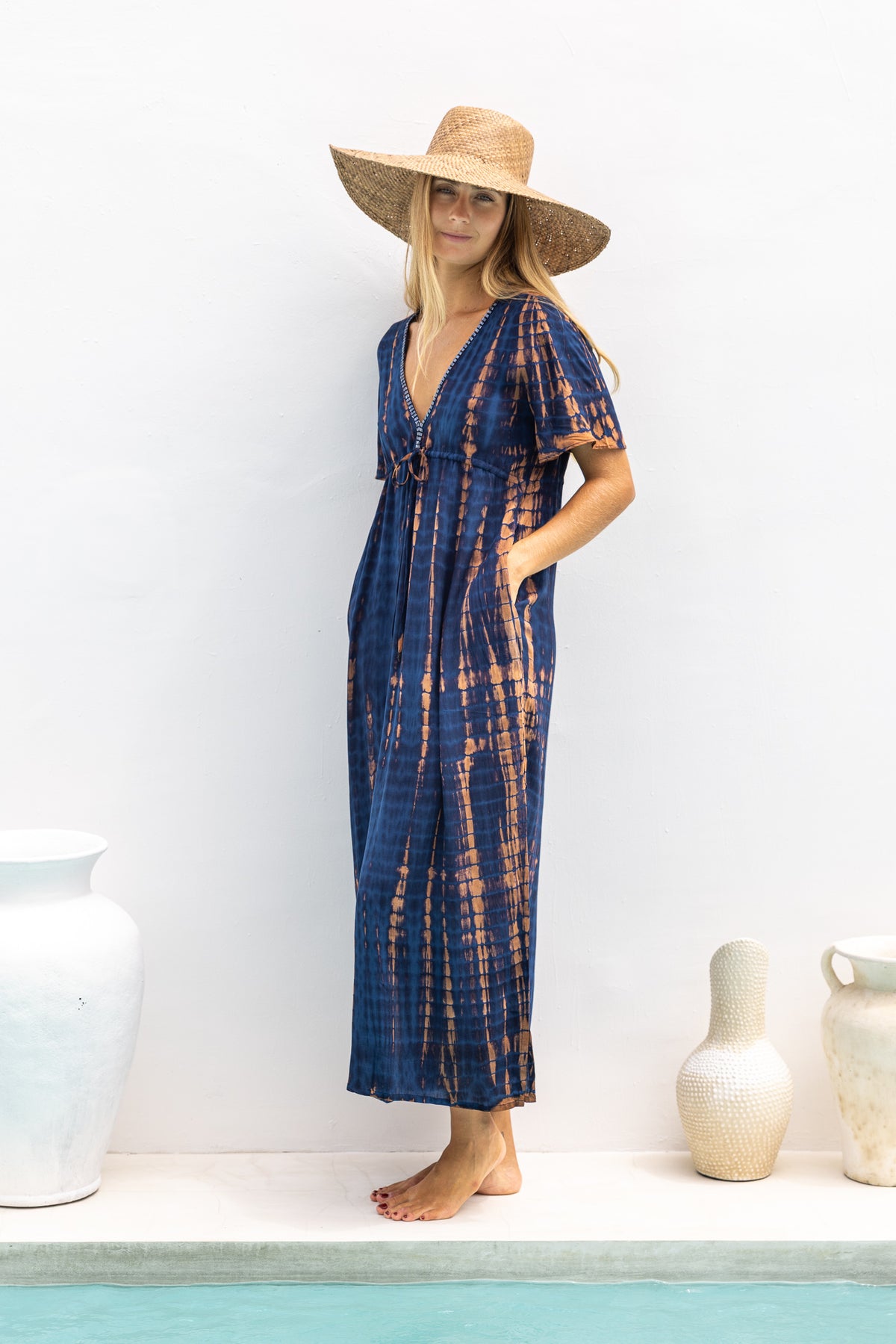 Womens Nadia Maxi Dress in navy and copper tie dye finish, in soft lightweight rayon, with side splits, pockets and hand beaded detailing.