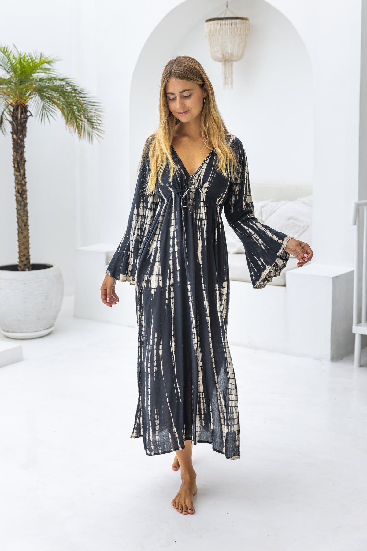 Womens Natalia Maxi Dress in black and cream tie dye finish, in soft lightweight rayon, with side splits, trumpet sleeves, pockets and hand beaded detailing.