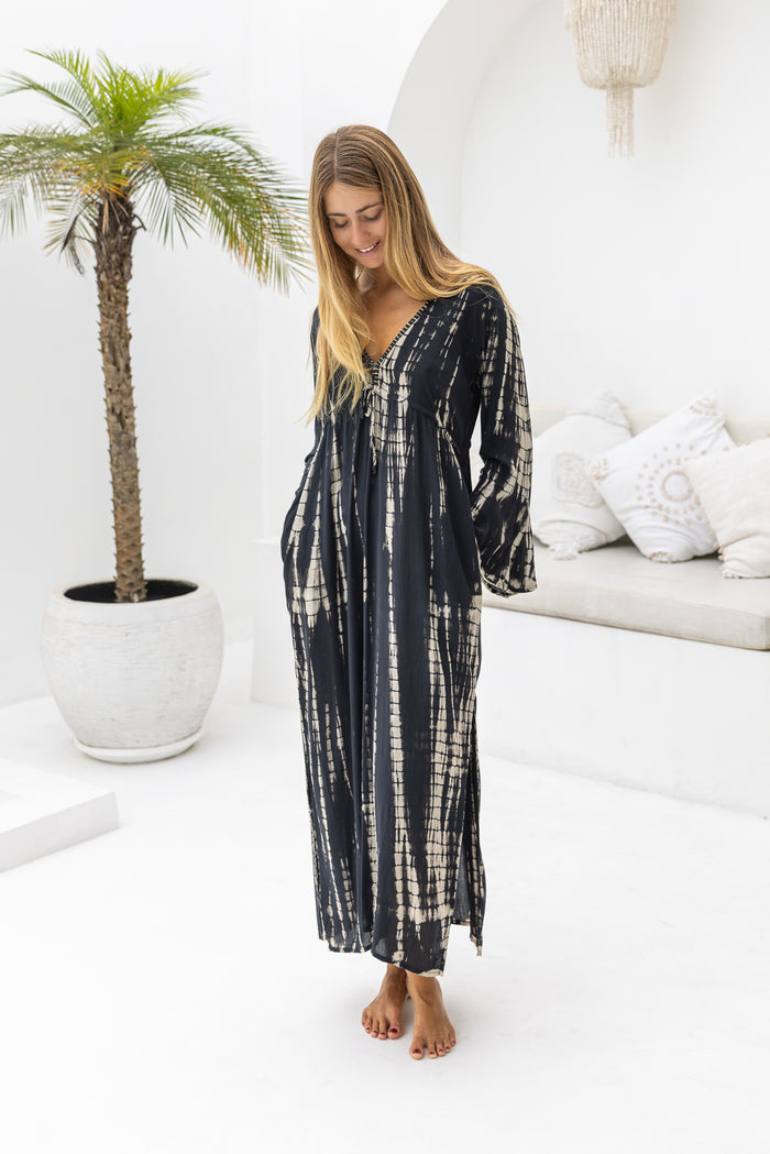Womens Natalia Maxi Dress in black and cream tie dye finish, in soft lightweight rayon, with side splits, trumpet sleeves, pockets and hand beaded detailing.