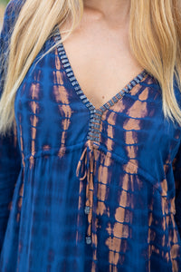 Womens Natalia Maxi Dress in navy and copper tie dye finish, in soft lightweight rayon, with side splits, trumpet sleeves, pockets and hand beaded detailing.