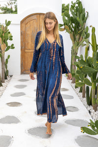 Womens Natalia Maxi Dress in navy and copper tie dye finish, in soft lightweight rayon, with side splits, trumpet sleeves, pockets and hand beaded detailing.