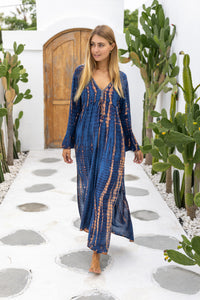 Womens Natalia Maxi Dress in navy and copper tie dye finish, in soft lightweight rayon, with side splits, trumpet sleeves, pockets and hand beaded detailing.