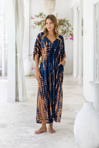 Womens Palmira Maxi Dress in is navy and copper tie dye finish, in soft lightweight rayon, with side splits, pockets and hand beaded detailing.