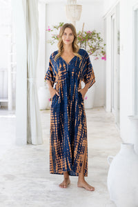 Womens Palmira Maxi Dress in is navy and copper tie dye finish, in soft lightweight rayon, with side splits, pockets and hand beaded detailing.