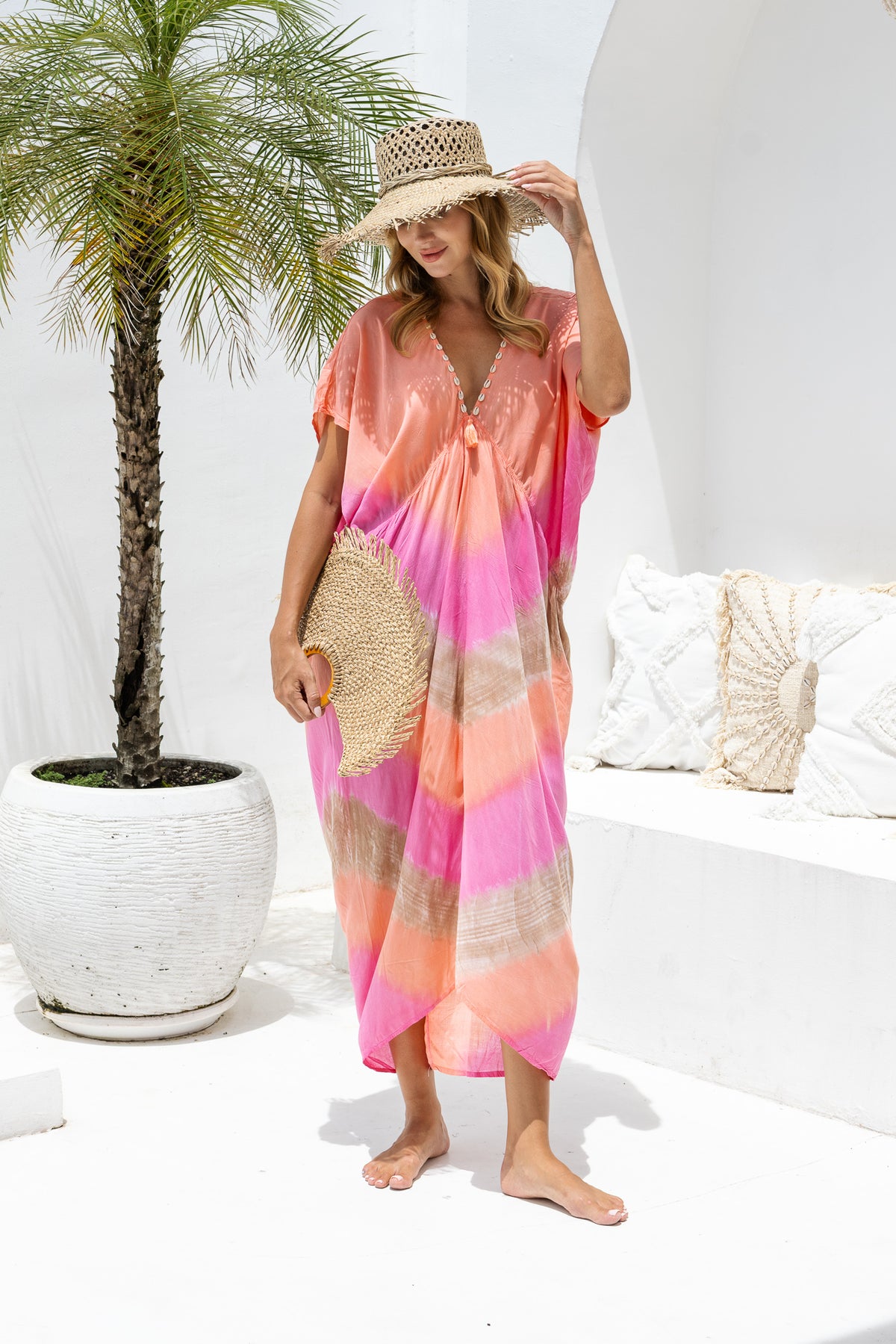 Womens Sadie tie dye boho kaftan dress in pink. Handmade in Bali in soft lightweight rayon with hand beaded details. 