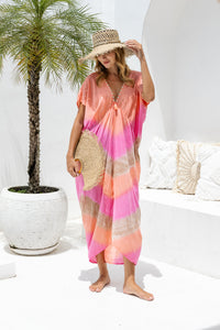 Womens Sadie tie dye boho kaftan dress in pink. Handmade in Bali in soft lightweight rayon with hand beaded details. 