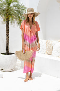 Womens Sadie tie dye boho kaftan dress in pink. Handmade in Bali in soft lightweight rayon with hand beaded details. 