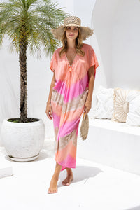 Womens Sadie tie dye boho kaftan dress in pink. Handmade in Bali in soft lightweight rayon with hand beaded details. 