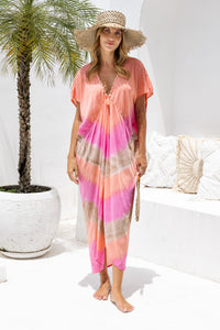 Womens Sadie tie dye boho kaftan dress in pink. Handmade in Bali in soft lightweight rayon with hand beaded details. 