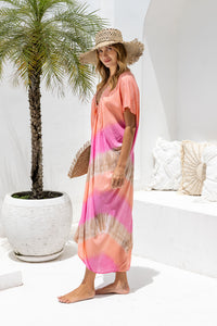 Womens Sadie tie dye boho kaftan dress in pink. Handmade in Bali in soft lightweight rayon with hand beaded details. 
