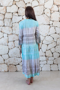 Womens super soft, lightweight, tunic style long length tie dye dress in aqua blue featuring 3/4 length trumpet sleeves and side pockets