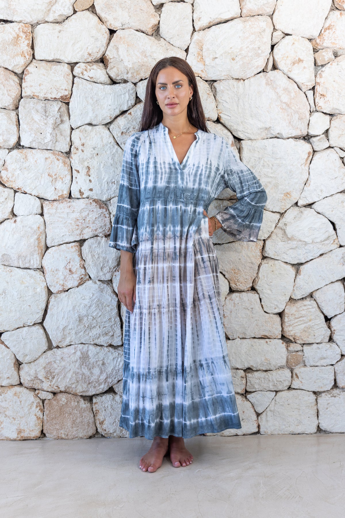 Womens super soft, lightweight, tunic style long length tie dye dress in light grey featuring 3/4 length trumpet sleeves and side pockets