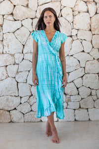 Womens super soft, lightweight, midi length tie dye dress in aqua blue featuring a ruffle detail and self tie fastening 