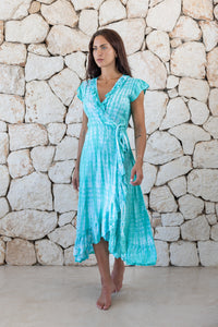 Womens super soft, lightweight, midi length tie dye dress in aqua blue featuring a ruffle detail and self tie fastening 